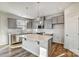 Modern kitchen with gray cabinets, white countertops, and stainless steel appliances at 6210 Vasey St, Charlotte, NC 28269