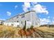 Gray townhome exterior with private fenced patio at 6210 Vasey St, Charlotte, NC 28269