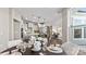 Kitchen and dining area with round table and access to the outdoors at 7567 Baybrooke Ln # 35, Harrisburg, NC 28075