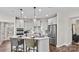 Modern kitchen with island and stainless steel appliances at 7567 Baybrooke Ln # 35, Harrisburg, NC 28075