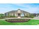 Community welcome center with landscaping and parking at 7567 Baybrooke Ln # 35, Harrisburg, NC 28075