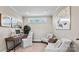 Bright home office with built-in desk and comfortable seating at 7567 Baybrooke Ln # 35, Harrisburg, NC 28075