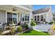 Spacious patio with seating area and lovely landscaping at 7567 Baybrooke Ln # 35, Harrisburg, NC 28075