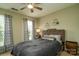 Bright bedroom with double bed, window, and ceiling fan at 525 Saint George Rd, Fort Mill, SC 29708