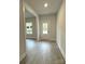 Bright and spacious entryway with vinyl plank flooring and neutral paint at 288 Bluegill Ln, Statesville, NC 28625