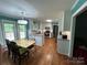 Eat-in kitchen with white cabinets and granite counters at 926 Courtney Ct, Concord, NC 28025