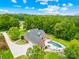 Aerial view of house, pool, and driveway at 112 Berea Baptist Church Rd, Stanfield, NC 28163