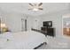 Spacious bedroom with a large bed and TV at 14508 Reese Blvd, Huntersville, NC 28078