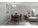 Bright dining room featuring an oval table and six chairs at 14508 Reese Blvd, Huntersville, NC 28078