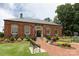 Brick City Hall building with landscaping and benches at 400 Ferrell Ave, Belmont, NC 28012