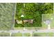 Aerial view of house, expansive green yard, and pond at 4539 S New Hope Rd, Gastonia, NC 28056