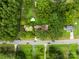 Aerial view showing house, large lot, and pond at 4539 S New Hope Rd, Gastonia, NC 28056