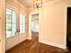Spacious entryway with hardwood floors and French doors leading outside at 310 Scalybark Trl, Concord, NC 28027