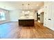 Modern kitchen featuring a large island and ample cabinet space at 310 Scalybark Trl, Concord, NC 28027