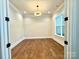 Bright home office features hardwood floors and recessed lighting at 310 Scalybark Trl, Concord, NC 28027