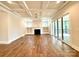 Spacious living room with hardwood floors, fireplace and built-in shelves at 310 Scalybark Trl, Concord, NC 28027