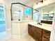 Spa-like bathroom with a large walk-in shower and double vanity at 310 Scalybark Trl, Concord, NC 28027
