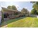 Ranch-style home with covered porch and fenced yard at 4120 Statesville Blvd, Salisbury, NC 28147