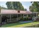 Ranch-style home with covered porch and yard at 4120 Statesville Blvd, Salisbury, NC 28147