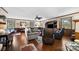 Relaxing living room with hardwood floors, comfortable seating, and a fireplace at 4120 Statesville Blvd, Salisbury, NC 28147