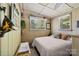 Serene bedroom with a comfortable bed and wooded views at 4120 Statesville Blvd, Salisbury, NC 28147