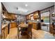 Charming kitchen with wood cabinets, round dining table and stainless steel appliances at 4120 Statesville Blvd, Salisbury, NC 28147