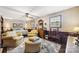 Spacious main bedroom with seating area and ceiling fan at 4120 Statesville Blvd, Salisbury, NC 28147