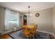 Charming dining room with wood table and chairs, plus a chandelier at 512 Battleground Rd, Lincolnton, NC 28092