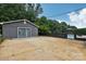 Spacious backyard with detached garage, pool, and gazebo at 642 Fielding Rd, Charlotte, NC 28214