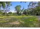 Spacious backyard with grassy area and mature trees at 1573 Timberlake Dr, Shelby, NC 28150