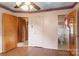 Bedroom with access to bathroom and hardwood floors at 1573 Timberlake Dr, Shelby, NC 28150