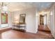 Inviting entryway with tile flooring, built-in shelving, and a large mirror at 1573 Timberlake Dr, Shelby, NC 28150