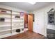 Spacious office with built-in shelving and access to a bathroom at 1573 Timberlake Dr, Shelby, NC 28150
