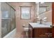 Bathroom with shower/tub combo and wood vanity at 1573 Timberlake Dr, Shelby, NC 28150