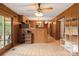 Sunroom with access to backyard and built-in shelving at 1573 Timberlake Dr, Shelby, NC 28150