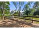 Wooden deck with seating area, overlooking the backyard at 1573 Timberlake Dr, Shelby, NC 28150