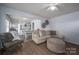 Open living room with a view into the kitchen and dining area at 1537 N Piedmont Ave, Kings Mountain, NC 28086