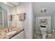 Bathroom with granite countertop and walk-in shower at 3208 Sedgefield Rd, Statesville, NC 28625
