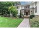 Modern house entrance with stone and landscaping at 3208 Sedgefield Rd, Statesville, NC 28625