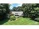House exterior showcasing a large backyard and landscaping at 3208 Sedgefield Rd, Statesville, NC 28625