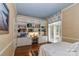 Bedroom with built-in shelving and window seating at 3208 Sedgefield Rd, Statesville, NC 28625