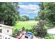 Outdoor patio with fire pit and golf course views at 3208 Sedgefield Rd, Statesville, NC 28625