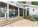 Home features a large covered patio and stone accents at 3208 Sedgefield Rd, Statesville, NC 28625