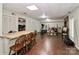 Finished basement features LVP flooring, built-in bar, and ample storage at 3208 Sedgefield Rd, Statesville, NC 28625