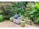 Built-in outdoor kitchen with grill and ample counter space at 3208 Sedgefield Rd, Statesville, NC 28625
