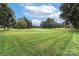 Property boasts a scenic view of a lush green golf course at 3208 Sedgefield Rd, Statesville, NC 28625