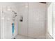 Large walk-in shower with white tile and glass enclosure at 3208 Sedgefield Rd, Statesville, NC 28625