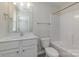 Clean bathroom with a tub, toilet, and single vanity at 2409 Via Dei Conte Aly, Charlotte, NC 28205