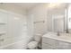 Clean bathroom with a shower/tub combo, toilet, and vanity at 2307 Via Dei Conte Aly, Charlotte, NC 28205