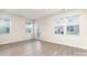 Empty bedroom with gray vinyl plank flooring and door to balcony at 2307 Via Dei Conte Aly, Charlotte, NC 28205